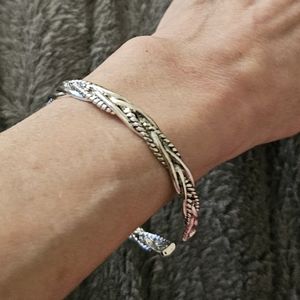 NWOT Sterling silver plated braided cuff bracelet.